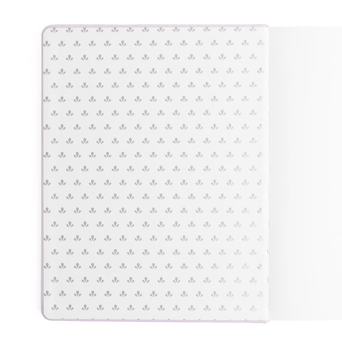 White mat with a subtle pattern on a white background