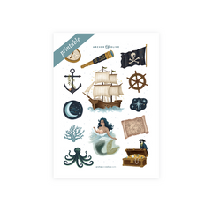 Sheet of pirate-themed stickers with ship, anchor, treasure chest, and mermaid on a white background.
